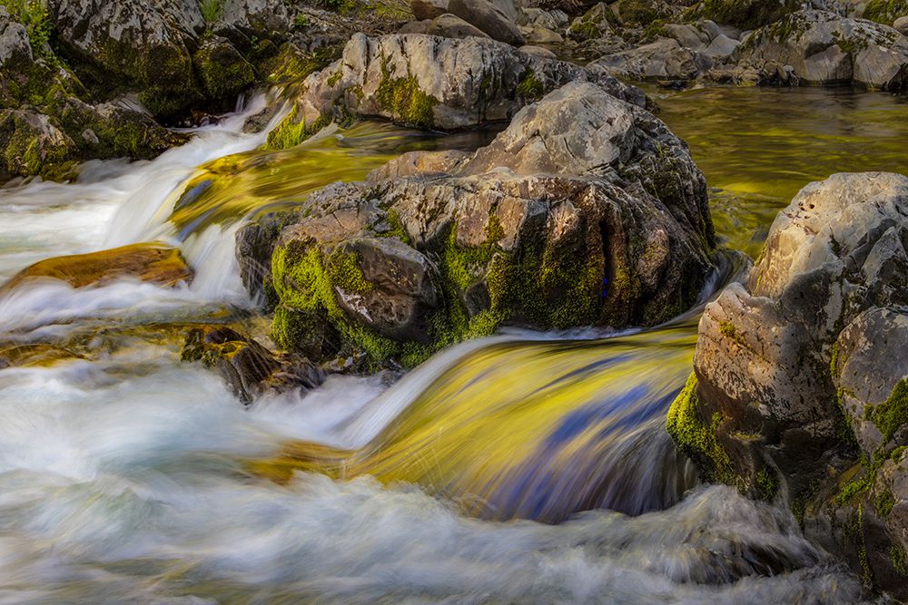Spring foliage colors and sky reflecting on ripples on stream, Great Smoky Mountains NP, Tennessee